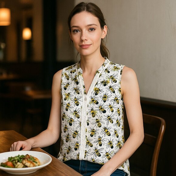 Modcloth Tops - ModCloth White Sleeveless Bee Print Blouse with Yellow Accents